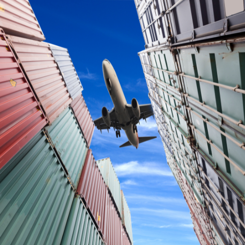 cro ekspres airplane over shipping containers